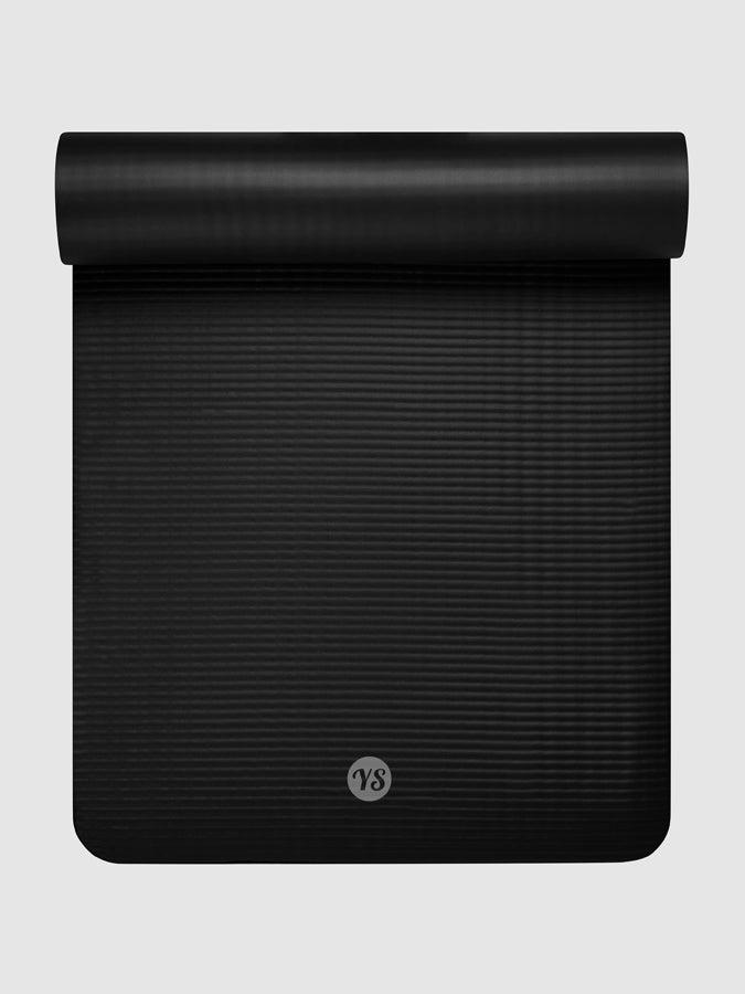 Black cushioned exercise mat for home workouts